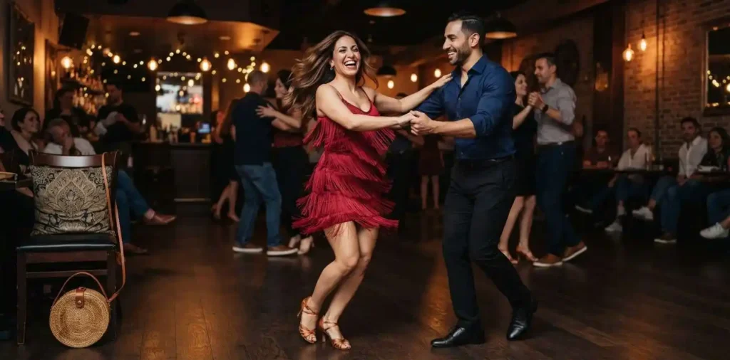 Couple dancing salsa together indoors