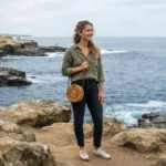 Traveler exploring the La Jolla Cove coastline