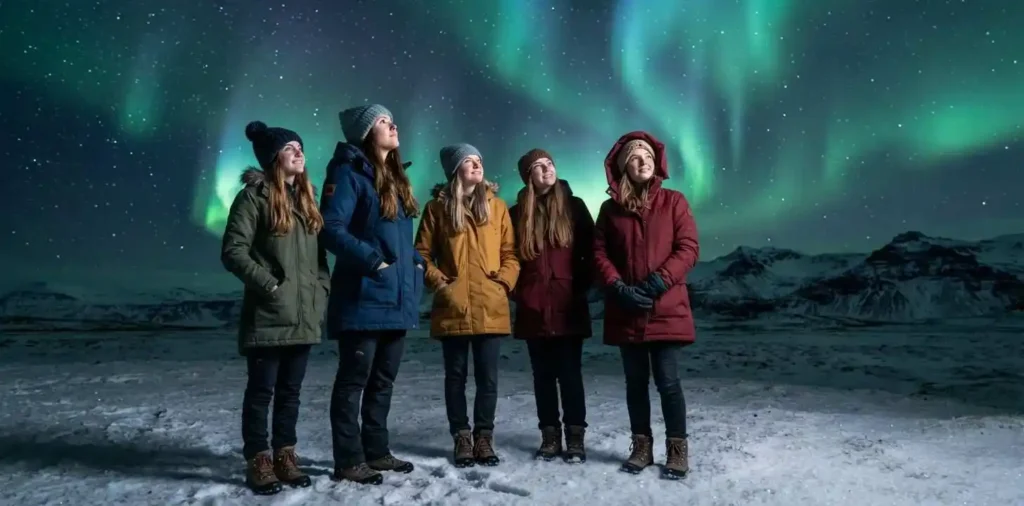 Traveler watching colorful Northern Lights